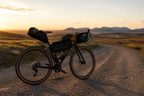 Loaded bikepacking bike on a remote route well suited to multi-day recording